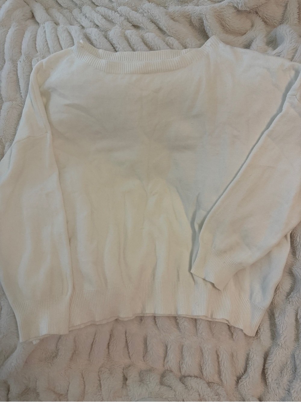 Woman’s white off the shoulder sweater Size